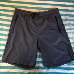 Mens athletic shorts with zipper pockets